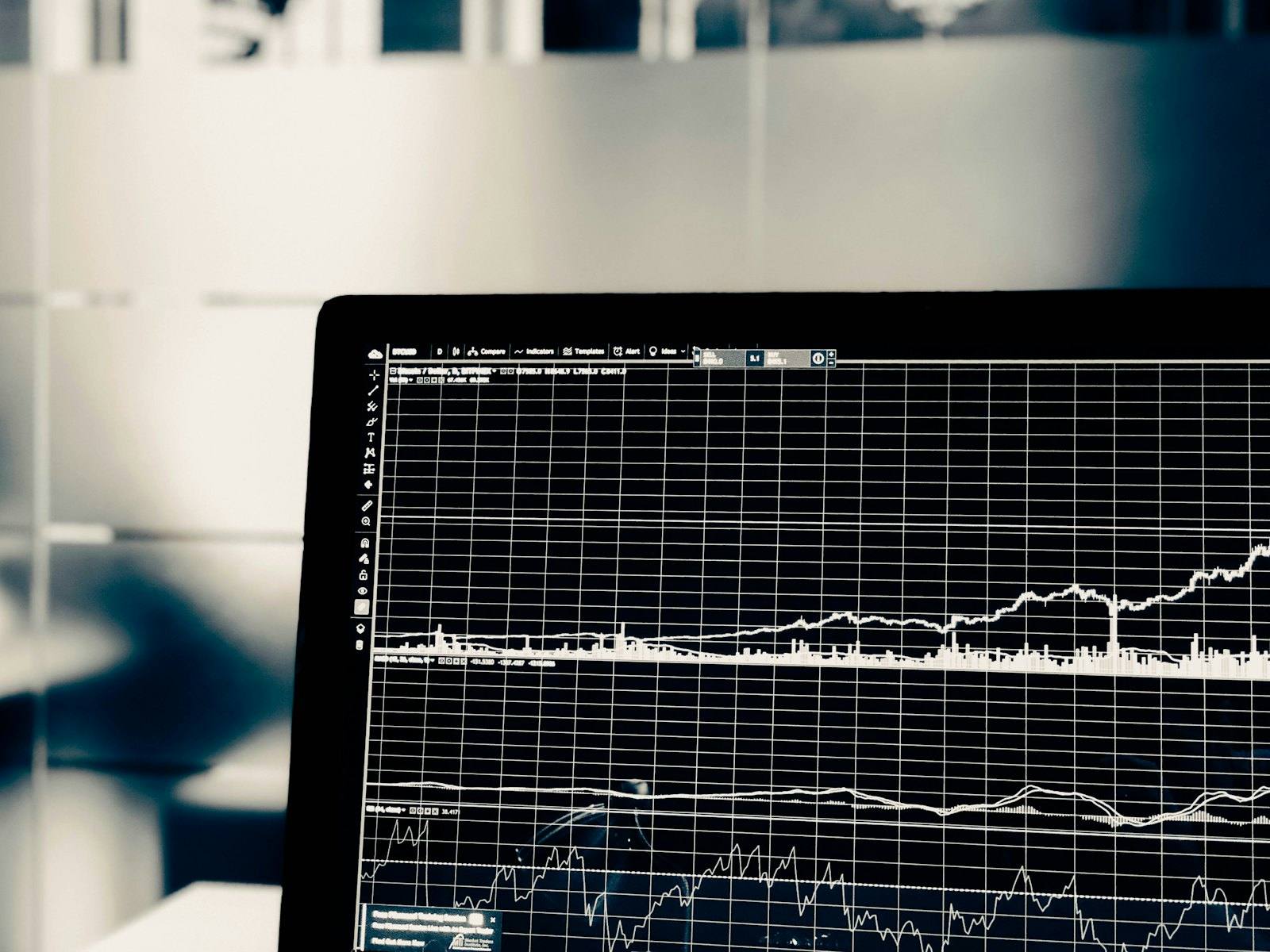 Stock market data displayed on a trading screen with red and green figures